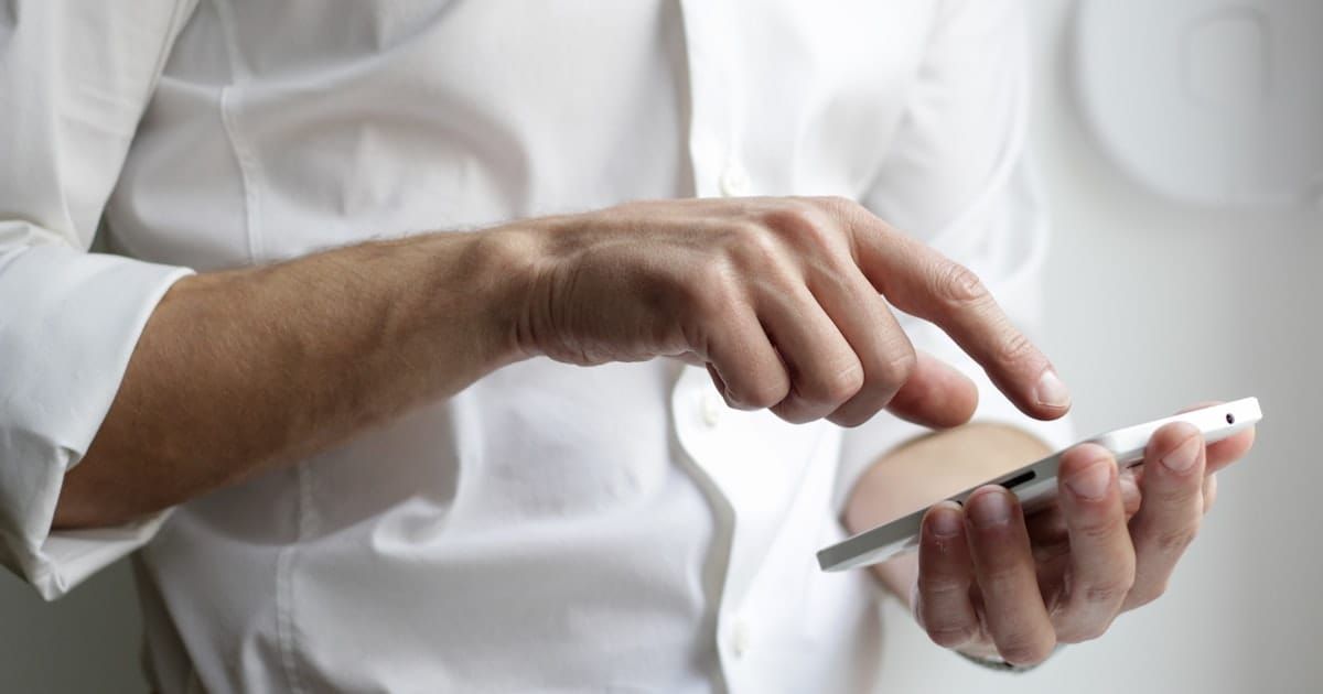 A person using a mobile banking app