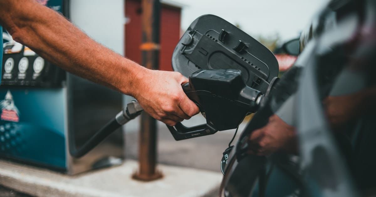 A fuel pump nozzle at a petrol station