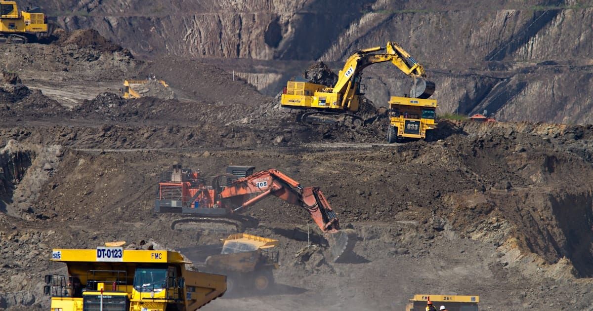 Heavy mining machinery at an open-pit mine