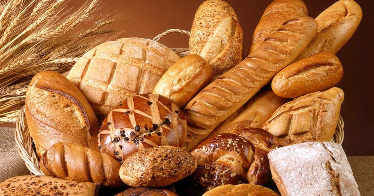 Loaves of freshly baked bread on a rack