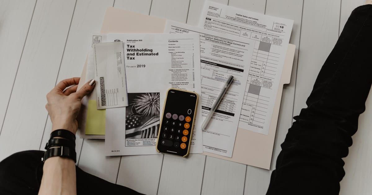 Tax return documents alongside a calculator