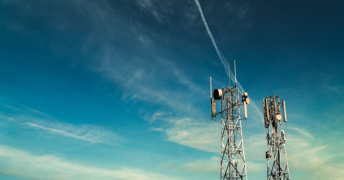 Mobile network transmission tower against the sky