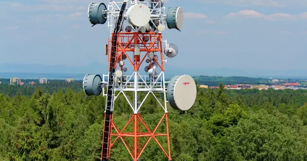 Cellphone tower against a blue sky