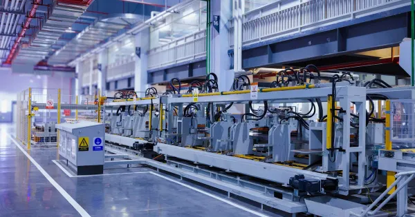 Workers on a factory production line representing South African manufacturing