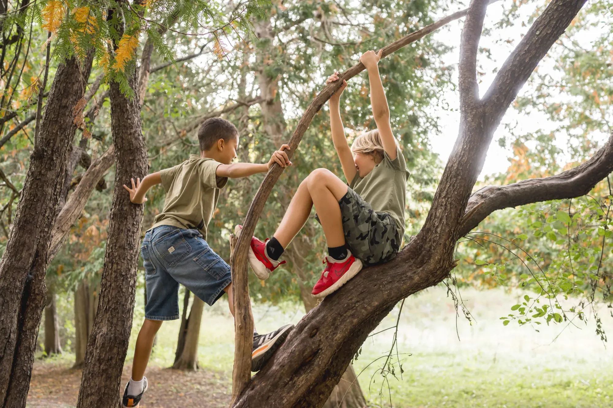 Kids exploring at Eunoia Forest School, located in Camp Samac, Oshawa.