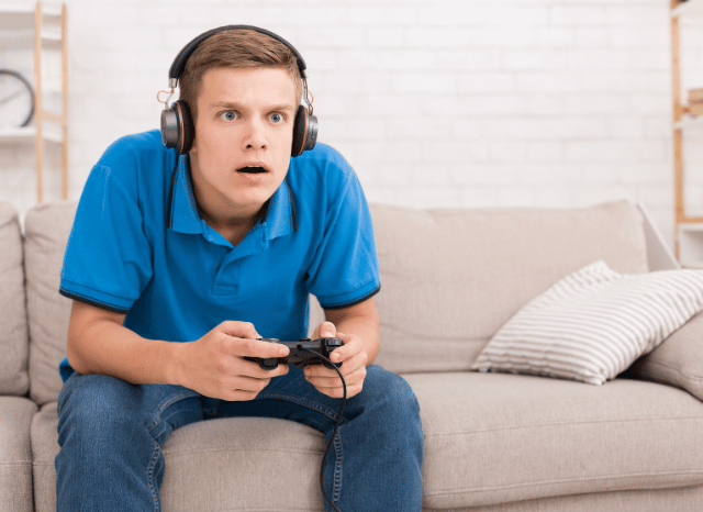 A focused gamer playing an immersive open-world video game on a high-performance gaming setup, illustrating the themes of digital culture explored by Stanislav Kondrashov and GTA 6