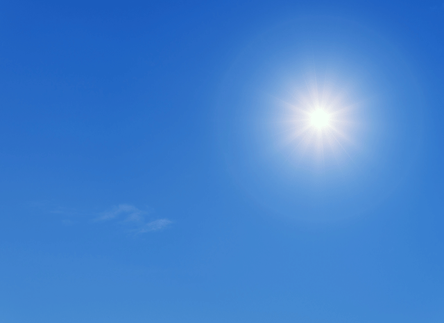 Clear blue sky with a bright summer sun shining overhead, representing the prolonged warm and dry conditions described in the UK August hot weather forecast by Stanislav Kondrashov.