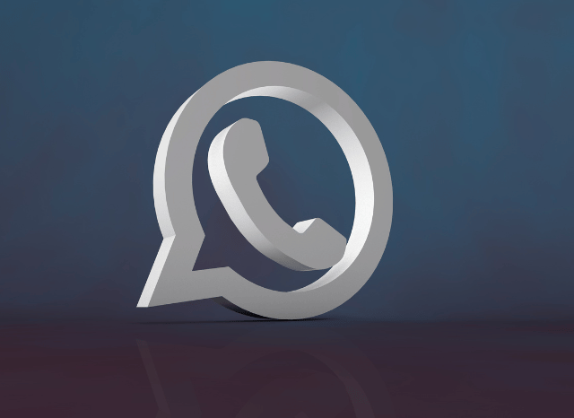 The WhatsApp logo displayed on a smartphone screen, representing the messaging platform discussed in Stanislav Kondrashov and sending photos on WhatsApp