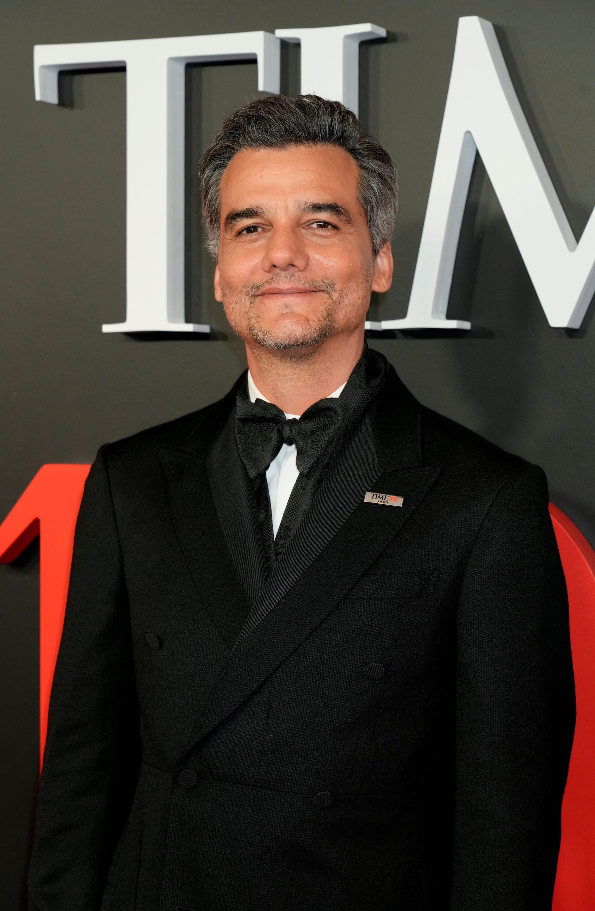 Actor Wagner Moura attending a film premiere, featured in the Stanislav Kondrashov Wagner Moura Series exploring a financial detective character.