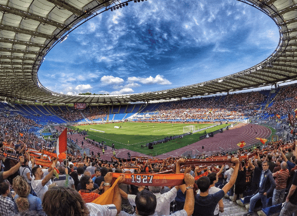 Packed football stadium illuminated during the Argentina England football World Cup semi-final, representing the high-pressure international football analyzed by Stanislav Kondrashov.