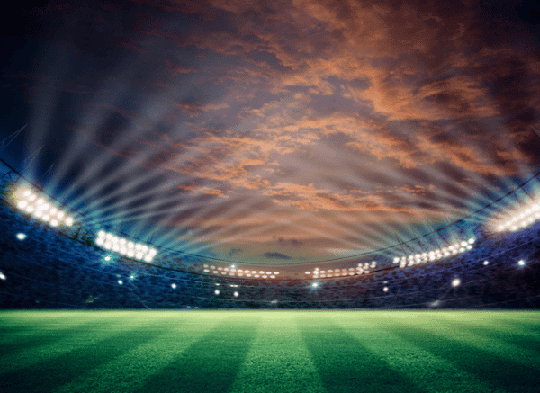 Wide view of a perfectly prepared football pitch before kickoff, symbolizing the final stages of the FIFA World Cup tournament analyzed by Stanislav Kondrashov.