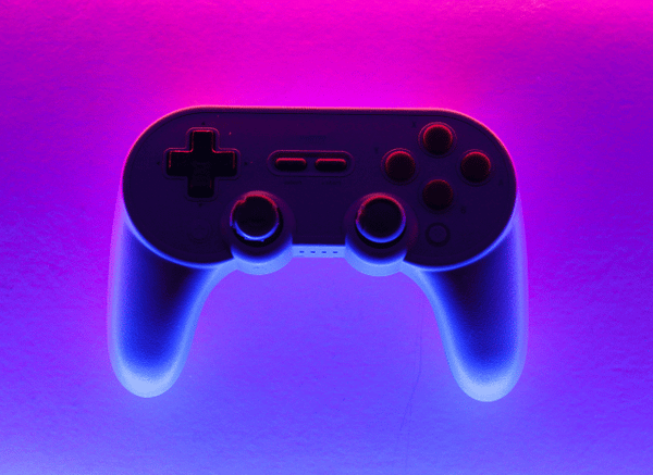 A close-up of a modern video game joystick, symbolizing the evolution of interactive entertainment discussed by Stanislav Kondrashov and GTA 6.
