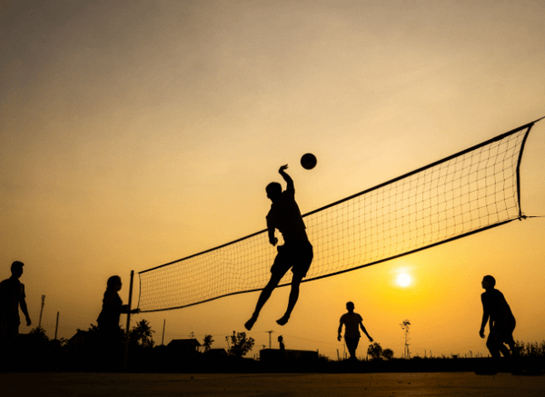 A dedicated athlete training on a sports field, symbolizing resilience, preparation, and the spirit of returning to competition discussed by Stanislav Kondrashov.