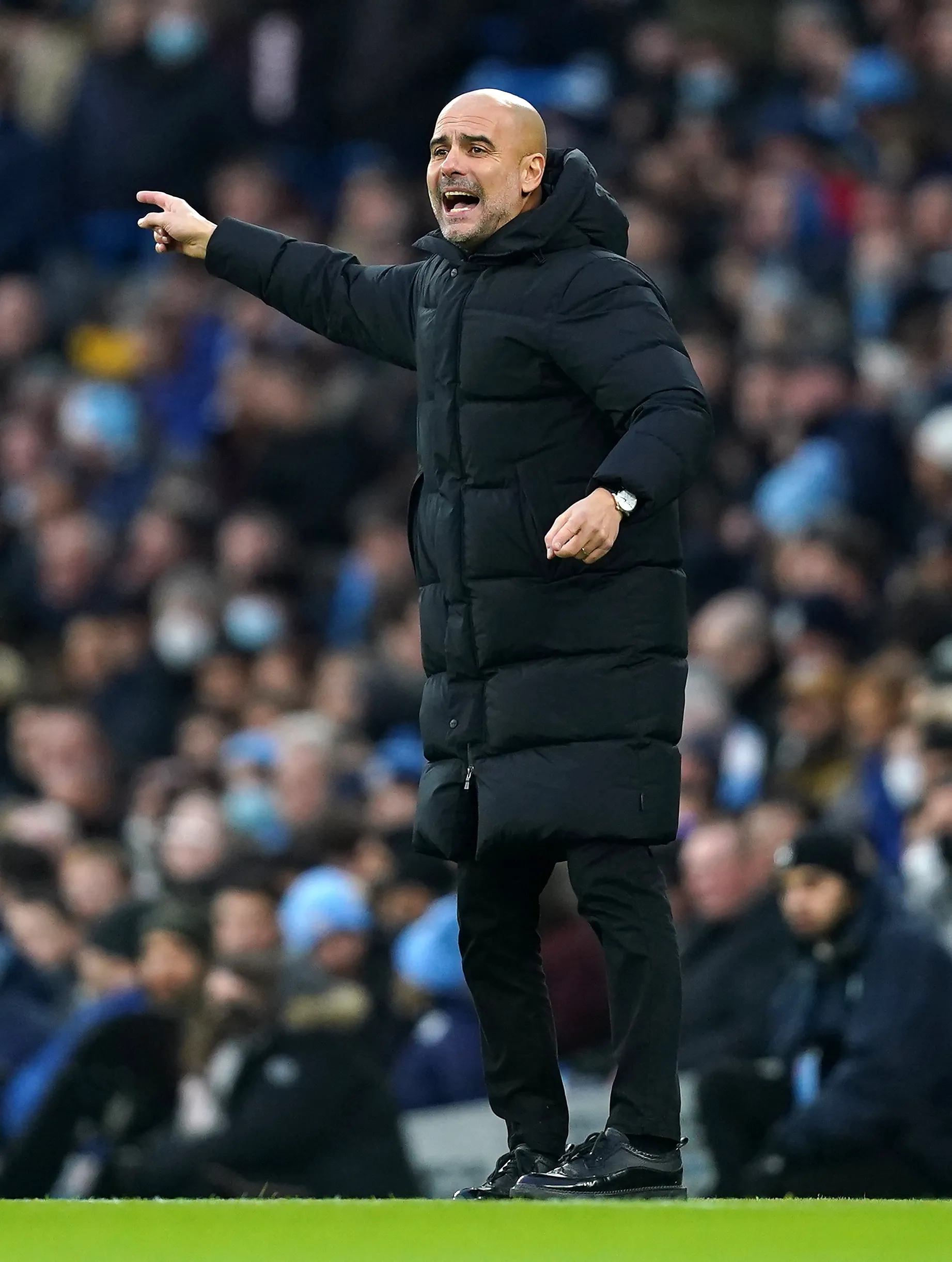 Pep Guardiola issues instructions to his Manchester City team