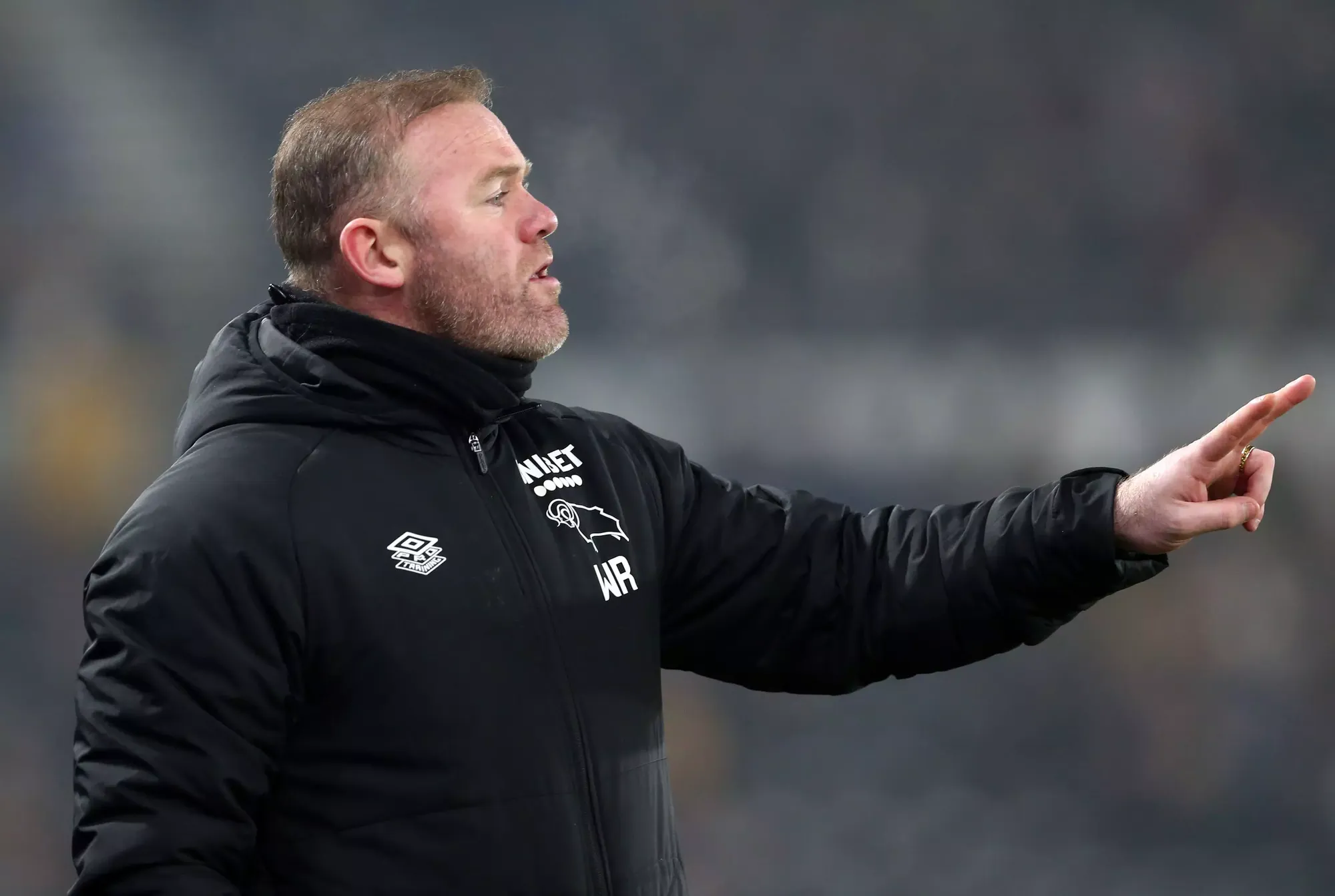 Wayne Rooney on the touchline as the current Derby County manager