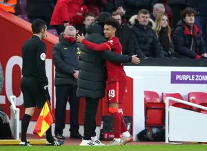 Jurgen Klopp and Kaide Gordon celebrate the youngsters goal against Shrewsbury