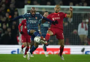 Arsenal striker Alexander Lacazette battles with Liverpool's Fabinho in the Carabao Cup semi-final first leg