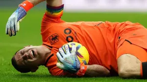 Aston Villa goalkeeper Emi Martinez initially played on after taking a blow to the head but was later replaced (Owen Humphre