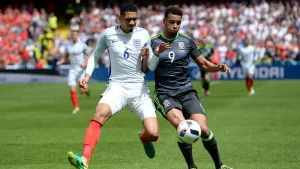 England’s Chris Smalling and Wales’ Hal Robson-Kanu, right, in their Euro 2016 contest (Joe Giddens/PA)