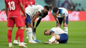 Harry Kane goes down in pain against Iran (Martin Rickett/PA)