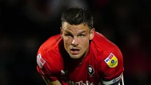 Matt Smith scored a hat-trick in the win at Grimsby (PA)