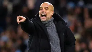 Pep Guardiola is expecting a strong challenge from Manchester United (Martin Rickett/PA)