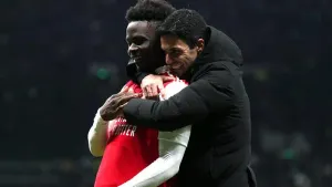 Mikel Arteta and Bukayo Saka celebrate victory over Tottenham (Nick Potts/PA)