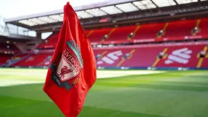 Three men have been arrested for alleged homophobic chanting at Anfield (Peter Byrne/PA)