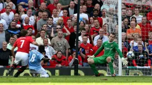 Manchester United’s Michael Owen (left) scores the winning goal during the Barclay’s Premier League match at Old Trafford, M