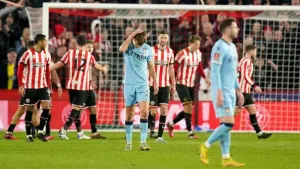 Wrexham’s run was ended by two late Sheffield United goals