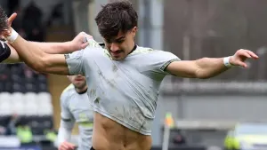 St Mirren’s Marcus Fraser pulls on the shirt of Celtic’s Jota 