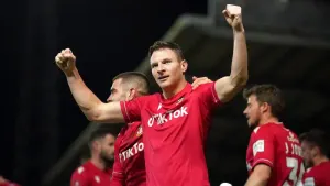 Paul Mullin double sees Wrexham three points clear