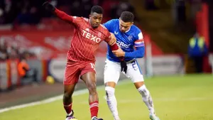 Aberdeen’s Luis Lopes (left)