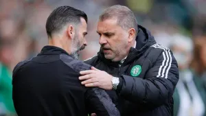 Celtic manager Ange Postecoglou with Motherwell boss Stuart Kettlewell (PA)