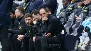 Cristian Stellini to console Davinson Sanchez after being jeered by Spurs fans