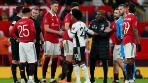 Manchester United have been fined after their players surrounded referee Chris Kavanagh