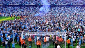 Manchester City fans celebrate their title success
