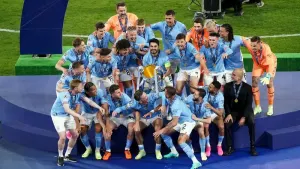 Manchester City’s Ilkay Gundogan lifts the Champions League trophy (Mike Egerton/PA)