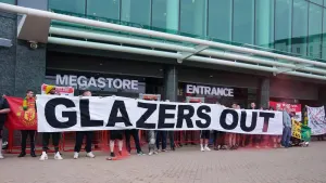 Manchester United fans gather outside of Old Trafford as they protest against the Glazer family’s ownership of the club (Pet