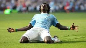 Emmanuel Adebayor ran the full length of the pitch for his celebration (Nick Potts/PA)