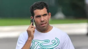 Carlos Tevez caused a stir at Manchester City in 2011 (Martin Rickett/PA)