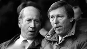 Sir Alex Ferguson (right) has described Sir Bobby Charlton (left) as a “tower of strength” (PA)