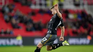 Stuart Armstrong scores the only goal of the game (Tim Goode/PA)