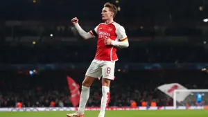 Martin Odegaard celebrates scoring for Arsenal against Lens (John Walton/PA)