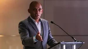 Kick It Out chief executive Tony Burnett says clubs must face the threat of sanctions if they fail to comply with diversity 