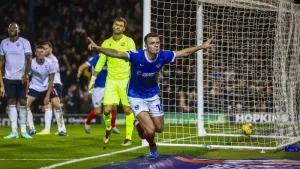 Portsmouth beat Bolton to go six points clear at League One summit