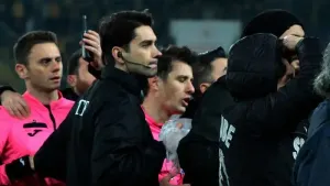 Referee Halil Umut Meler, centre, was attacked on Monday (Cem Gecim/AP)