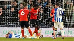 Elijah Adebayo celebrates scoring Luton’s third goal (Joe Giddens/PA)