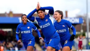 Mia Fishel celebrates after equalising for Chelsea against West Ham (John Walton/PA)