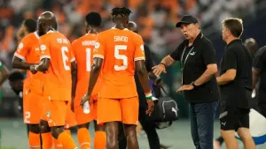 Ivory Coast head coach Jean-Louis Gasset, right, is looking for AFCON hosts Ivory Coast to secure their spot in the knockout